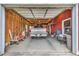 View of the garage, showcasing ample space for a truck and other equipment, with an open garage door at 1961 Bright Rd., Little River, SC 29566