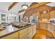 Gourmet kitchen boasting brick accents, stainless steel appliances, and a central island at 1961 Bright Rd., Little River, SC 29566