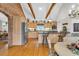 Spacious kitchen featuring wood beams, stainless steel appliances, and a breakfast bar at 1961 Bright Rd., Little River, SC 29566