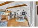Eat-in kitchen featuring vaulted ceilings with wood beams and a stone fireplace at 1961 Bright Rd., Little River, SC 29566