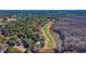 Scenic aerial view overlooking a golf course with lush greenery and mature trees, perfect for outdoor enthusiasts at 1969 Governors Landing Rd. # 224, Murrells Inlet, SC 29576