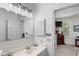 Bathroom with single sink vanity and access to the main living areas at 1969 Governors Landing Rd. # 224, Murrells Inlet, SC 29576