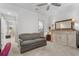 Bright living area with comfortable seating, and a large decorative mirror at 1969 Governors Landing Rd. # 224, Murrells Inlet, SC 29576