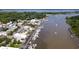 Picturesque aerial view showcasing a waterfront town, marina, and beautiful natural surroundings at 203 Broad St., Georgetown, SC 29440