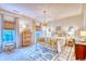 Charming bedroom with patterned rug, neutral colors, statement lighting, and comfortable furnishings at 203 Broad St., Georgetown, SC 29440