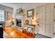 Charming living room featuring a fireplace, hardwood floors, and refined decor at 203 Broad St., Georgetown, SC 29440