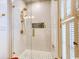 Bright bathroom featuring a glass shower, white subway tile, and gold hardware accents at 203 Broad St., Georgetown, SC 29440