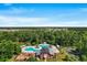 Aerial view of the community's outdoor pool, playground, and clubhouse at 2336 Windmill Way, Myrtle Beach, SC 29579