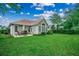 Spacious backyard with patio, green grass, and well-maintained landscaping at 24 Willowbend Dr., Murrells Inlet, SC 29576