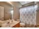 Bathroom featuring a vanity, toilet, and shower with curtain at 24 Willowbend Dr., Murrells Inlet, SC 29576