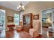 Elegant dining area featuring a chandelier and seamless access to other rooms in the home at 24 Willowbend Dr., Murrells Inlet, SC 29576