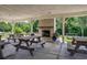 Shaded community picnic area featuring picnic tables and a brick fireplace with grills at 24 Willowbend Dr., Murrells Inlet, SC 29576