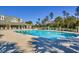 Resort style community swimming pool with lounge chairs and a covered patio area at 24 Willowbend Dr., Murrells Inlet, SC 29576