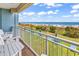 Enjoy this beach view from the balcony with comfortable seating at 2501 S Ocean Blvd. # 111, Myrtle Beach, SC 29577