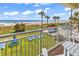 Relaxing balcony view of the beach with lawn chairs and picnic table for outdoor enjoyment at 2501 S Ocean Blvd. # 111, Myrtle Beach, SC 29577