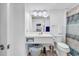 Bright bathroom featuring a vanity with storage and an enclosed shower at 2501 S Ocean Blvd. # 111, Myrtle Beach, SC 29577