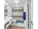 Clean bathroom with a mirror, toilet, and sink with vanity at 2501 S Ocean Blvd. # 111, Myrtle Beach, SC 29577