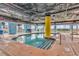 Bright indoor pool area with ample seating and a shallow section for  at 2501 S Ocean Blvd. # 111, Myrtle Beach, SC 29577