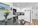Bright kitchen featuring white cabinets and stainless steel appliances at 2501 S Ocean Blvd. # 111, Myrtle Beach, SC 29577