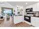 The kitchen and living area offer a seamless blend with ocean views at 2501 S Ocean Blvd. # 111, Myrtle Beach, SC 29577