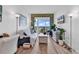 Comfortable living room with ocean views and access to a balcony at 2501 S Ocean Blvd. # 111, Myrtle Beach, SC 29577
