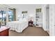 Inviting bedroom with a view and a decorative bookshelf at 2501 S Ocean Blvd. # 111, Myrtle Beach, SC 29577