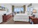 Spacious main bedroom featuring dresser, nightstand, beach view and sliding glass door at 2501 S Ocean Blvd. # 111, Myrtle Beach, SC 29577