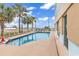 Outdoor pool with plenty of space to sit and relax, along with palm trees at 2501 S Ocean Blvd. # 111, Myrtle Beach, SC 29577