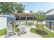 Inviting backyard with pergola, swing, seating and above-ground pool at 2588 Long Avenue Ext., Conway, SC 29526