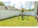 Well-maintained backyard with lush green lawn and quaint outdoor seating area at 2588 Long Avenue Ext., Conway, SC 29526