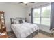 Comfortable bedroom with large window and wood-look floors at 2588 Long Avenue Ext., Conway, SC 29526