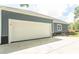 Attached garage with ample parking space and exterior window at 2588 Long Avenue Ext., Conway, SC 29526