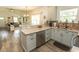 Bright, open kitchen area with granite countertops and stainless steel dishwasher at 2588 Long Avenue Ext., Conway, SC 29526