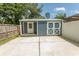 Backyard shed with double doors and concrete pad at 2588 Long Avenue Ext., Conway, SC 29526
