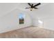 Cozy bedroom featuring neutral carpet, a ceiling fan, and a window with natural light at 2595 Buck Scrape Rd., Myrtle Beach, SC 29588