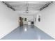 Spacious garage with epoxy flooring, laundry hookups, storage cabinets and natural light at 2595 Buck Scrape Rd., Myrtle Beach, SC 29588