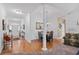 Open concept dining room features hardwood floors, chandelier, seating for four at 2636 Brick Dr., Longs, SC 29568