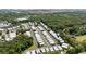Panoramic aerial view showcasing the property within a beautifully landscaped neighborhood near green wooded areas at 281 Lumbee Circle, Pawleys Island, SC 29585