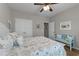 Comfortable bedroom featuring themed bedding and a bench for relaxation at 281 Lumbee Circle, Pawleys Island, SC 29585
