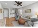 Cozy living room featuring a ceiling fan, comfortable seating, and a convenient beverage bar at 281 Lumbee Circle, Pawleys Island, SC 29585