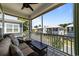 Inviting porch featuring comfortable seating and neighborhood views at 281 Lumbee Circle, Pawleys Island, SC 29585