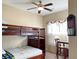Bedroom featuring bunkbeds, a small table, and a ceiling fan at 348 Basswood Ct., Conway, SC 29526