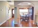 Elegant dining area featuring wood floors, ample lighting, and space for a large table at 348 Basswood Ct., Conway, SC 29526