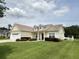 Inviting one-story home featuring manicured lawn, dormer windows, and mature landscaping at 348 Basswood Ct., Conway, SC 29526
