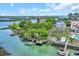 Aerial view of a waterfront property with lush greenery, private docks, and serene water access at 3659 Jordan Landing Rd., Murrells Inlet, SC 29576