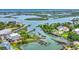 Breathtaking aerial view showcases waterfront homes with private docks on a picturesque coastal waterway and ocean at 3659 Jordan Landing Rd., Murrells Inlet, SC 29576