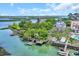 Aerial view of a waterfront property with lush greenery, private docks, and serene water access at 3659 Jordan Landing Rd., Murrells Inlet, SC 29576