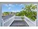 Balcony overlooking a tree-lined landscape and neighborhood at 3659 Jordan Landing Rd., Murrells Inlet, SC 29576