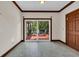 Dining room with doors leading to a backyard deck and backyard views at 3659 Jordan Landing Rd., Murrells Inlet, SC 29576
