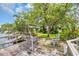 Relaxing waterfront dock featuring a wooden gazebo, Adirondack chairs, and scenic water views at 3659 Jordan Landing Rd., Murrells Inlet, SC 29576